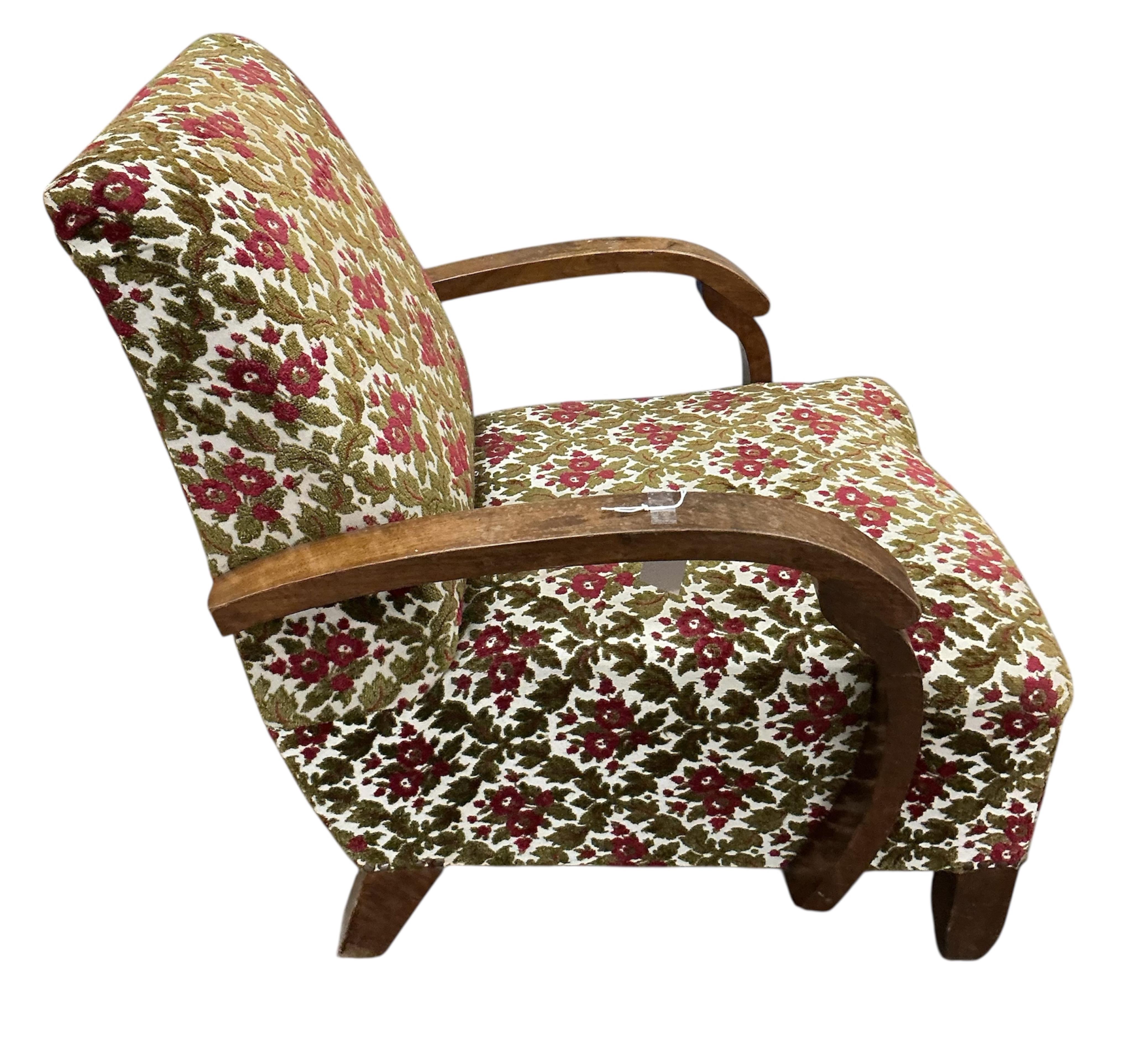 A pair of French Art Deco walnut armchairs, width 65cm, depth 74cm, height 80cm